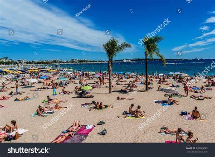 Beach goers enjoying the water in Fort Lauderdale before the first massive influx of college students arrive this weekend from all over the U.S.