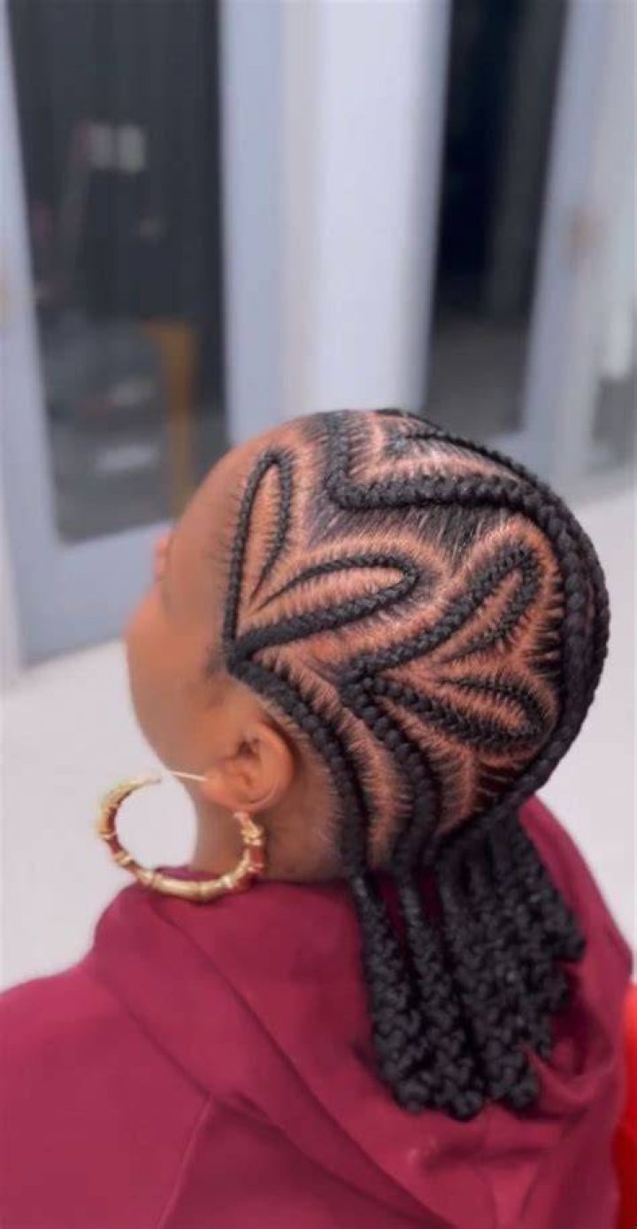 Braided: Adding Jessie's signature Western hat on top, she styled her glossy locks into two braids