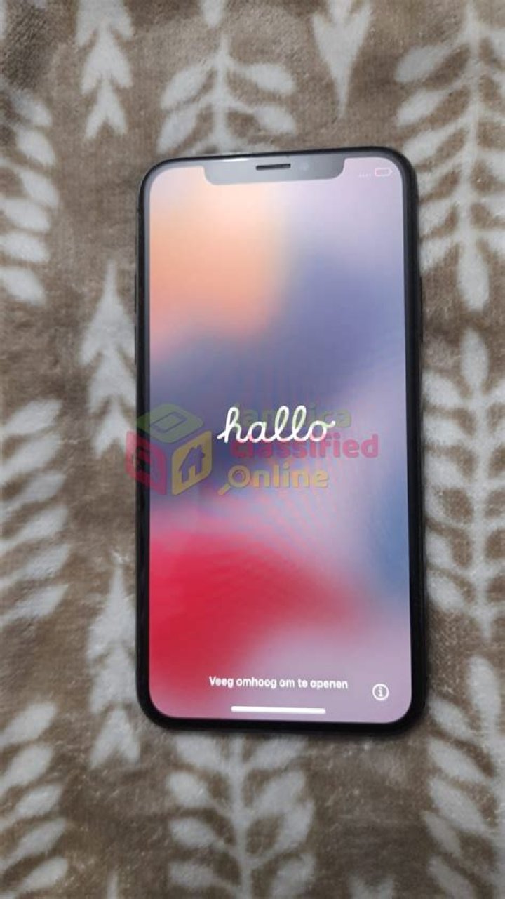 Brand new iPhone X with box on table | Source: Unsplash