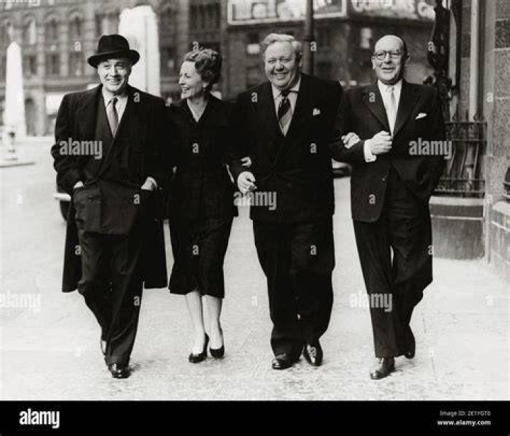 Charles Boyer, Agnes Moorhead, Charles Laughton, and Sir Cedric Hardwicke taking a stroll through Manchester, circa 1950s. | Photo: Getty Images