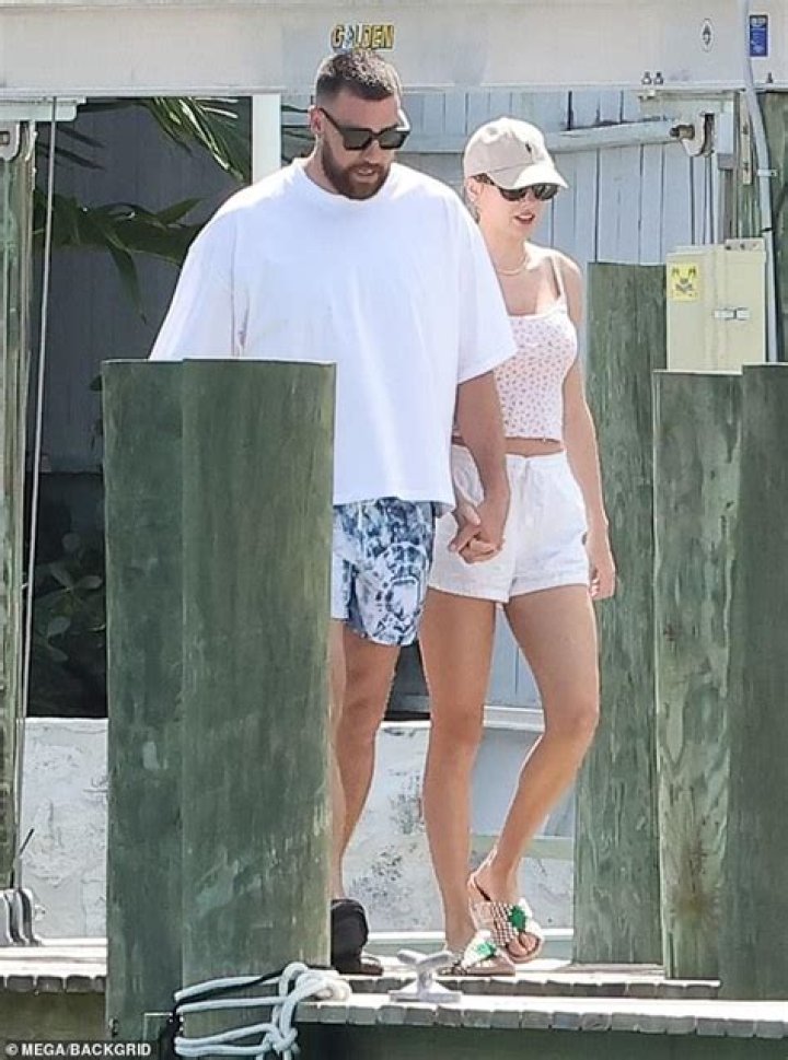 Close: The pair sweetly held hands as they enjoyed the sunny stroll around London together on Thursday