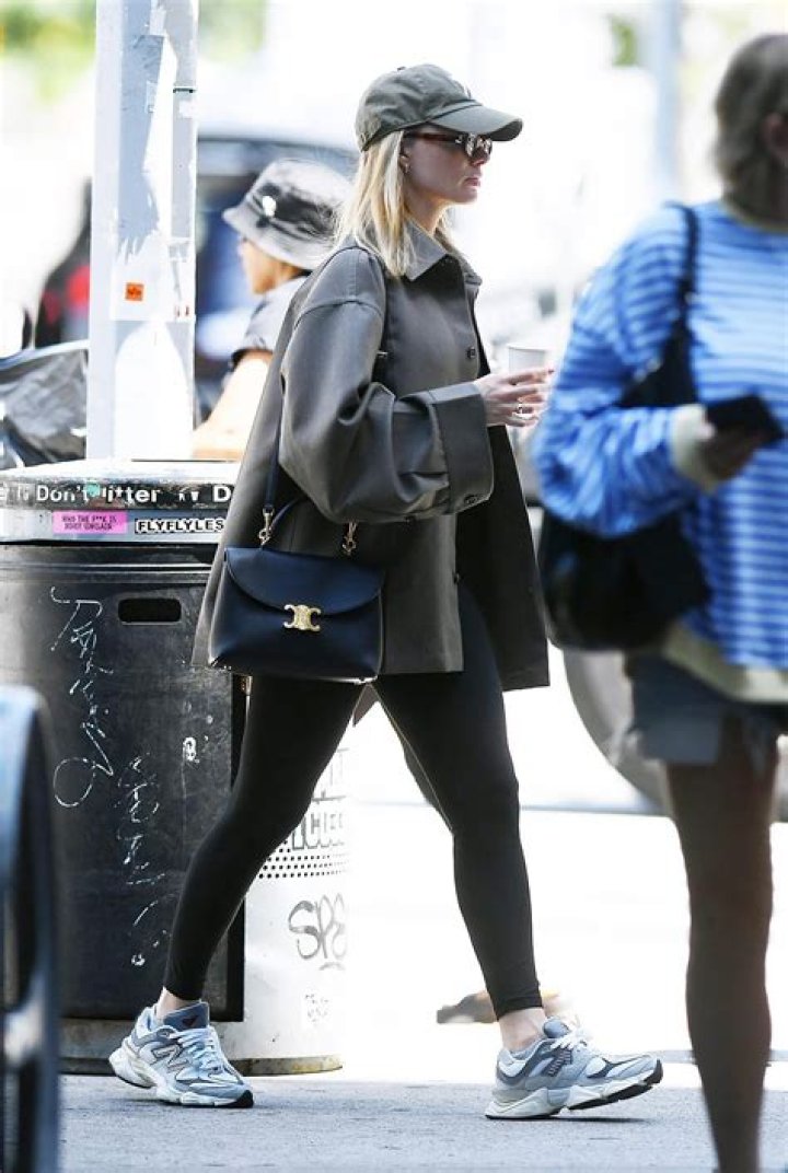 Comfortable clothing: Bieber wore a light gray puffy jacket and a near-matching pair of athletic leggings while spending time with her friend