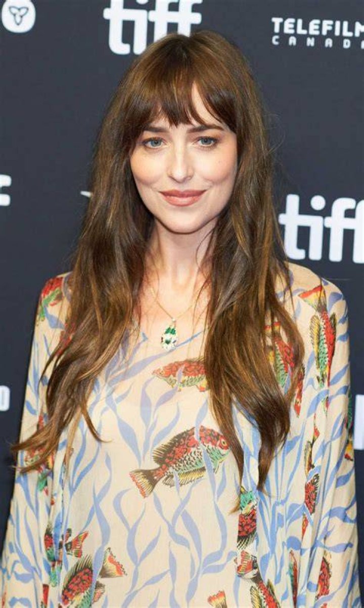 Dakota Johnson attends the "Fifty Shades Freed" premiere at Salle Pleyel in Paris, France on February 6, 2018 | Source: Getty Images
