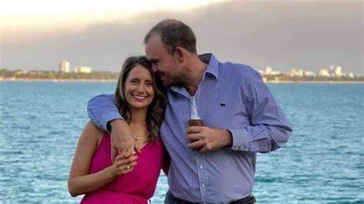 Dani Wilson (pictured with husband Chris) said how proud the adventurer was of his work collecting crocodile eggs, his farm, his 'filming', and had recently got his helicopter licence