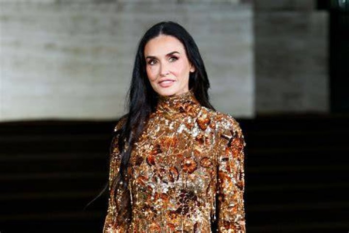 Demi Moore during the Planet Hollywood Grand Opening Celebration at Planet Hollywood, 9560 Wilshire Blvd. on September 17, 1995 in Beverly Hills, California. / Source: Getty Images