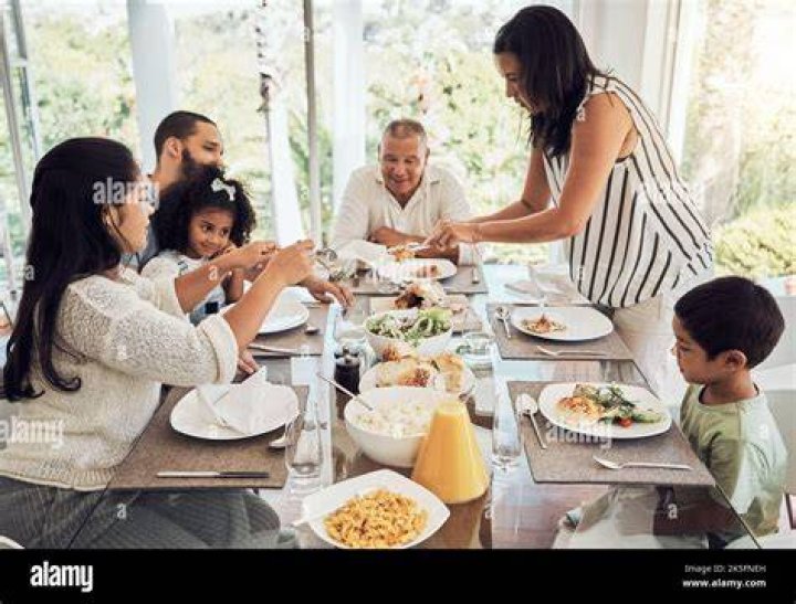 Family sitting together for lunch | Source: Pexels