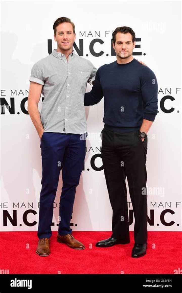 Henry Cavill and Armie Hammer pose for a photo during SiriusXM's Entertainment Weekly Radio on August 12, 2015, in New York City | Source: Getty Images