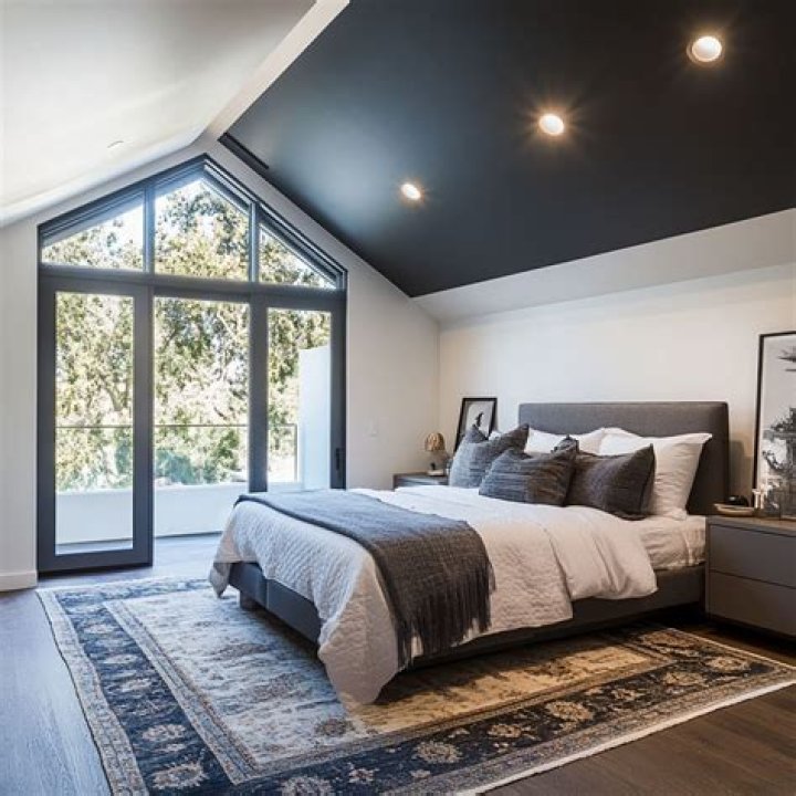 Impressive: Both the bedroom and living room feature sliding floor-to-ceiling French doors that provide abundant light and can be slid open to reveal the pristine view