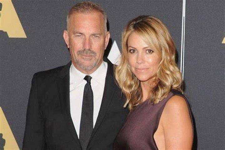 Kevin Costner,&nbsp;his wife Christine Baumgartner, and their son&nbsp;Cayden Costner during the Sprint Fan Zone&nbsp;on July 5, 2008, in Daytona Beach, Florida | Source: Getty Images