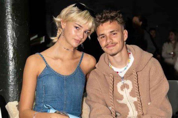 Mia Regan, Romeo Beckham, Cruz Beckham, Harper Beckham, David Beckham, Victoria Beckham, Brooklyn Beckham, and Nicola Peltz at the Netflix "Beckham" UK Premiere in London, England on October 03, 2023. | Source: Getty Images