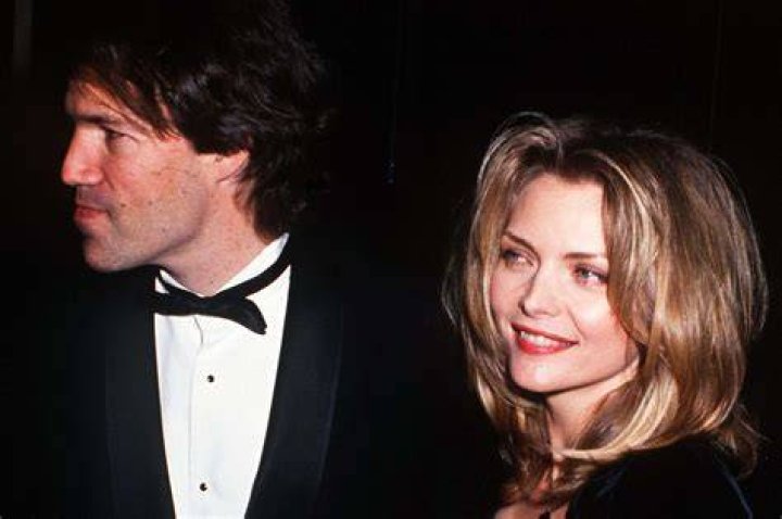 Michelle Pfeiffer and David E. Kelley at the United Center on June 22, 2013 in Chicago, Illinois. | Source: Getty Images