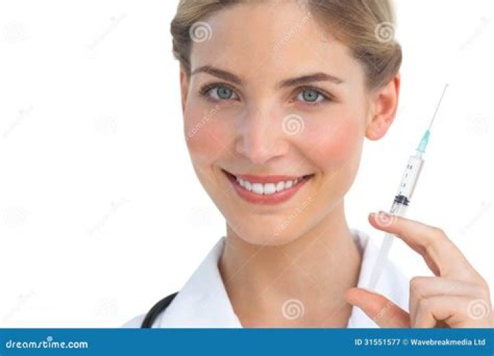 Nurse holding syringe