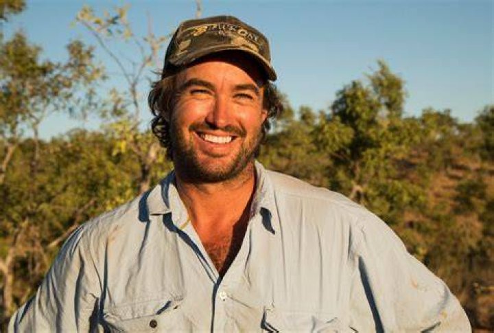 Outback Wrangler star Matt Wright holds a cowboy hat during the funeral service of his co-star Chris Mellon in March. He wasn't mentioned in Dannielle Mellon's eulogy