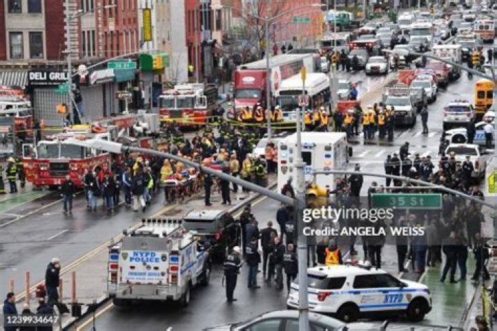 Police vehicles crowd the streets near the fatal shooting in the Bronx.