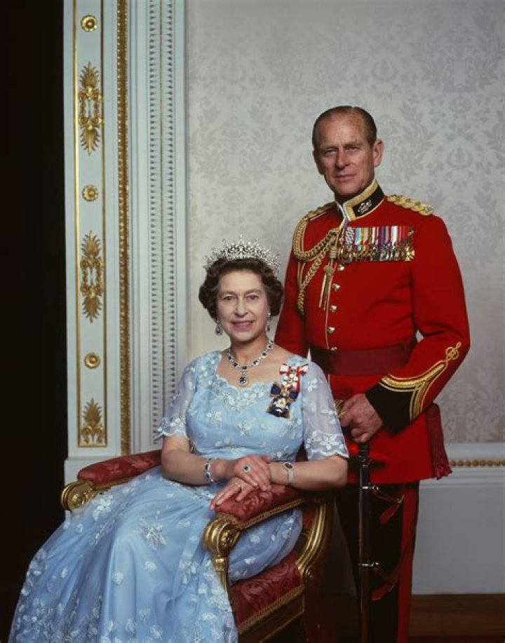 Queen Elizabeth, Prince Philip, Prince Andrew and Prince Edward waving to the crowds from the balcony at Buckingham Palace, during the Trooping of the Color. | Source: Getty Images