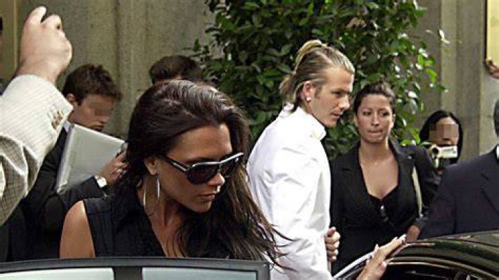 Rebecca Loos, Victoria Beckham, and Romeo Beckham during the Spanish Primera Liga match between Real Madrid and Valladolid in Madrid, Spain on September 13, 2003 | Source: Getty Images
