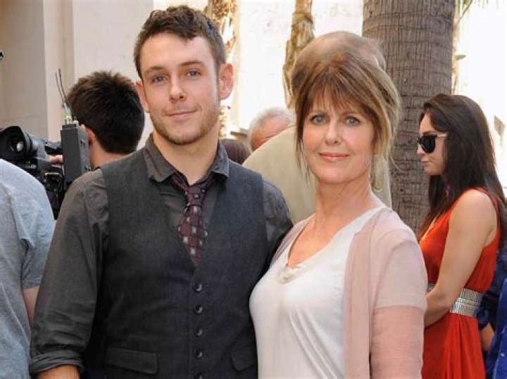 Sean Harmon and Pam Dawber at Mark Harmon's Hollywood Walk of Fame star ceremony in Hollywood, 2012 | Source: Getty Images