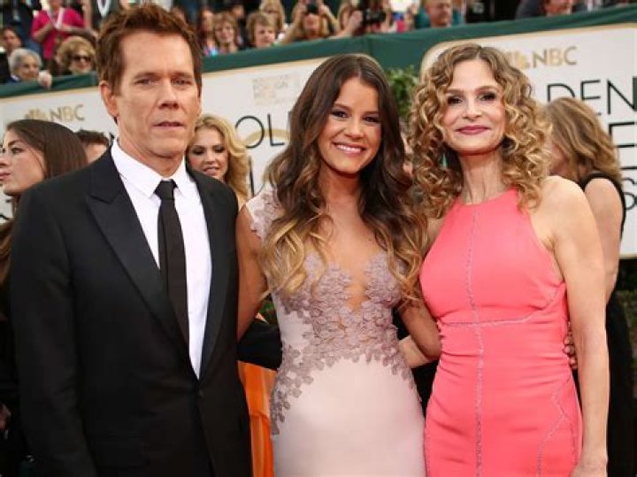 Sosie Bacon, actors Kevin Bacon and Kyra Sedgwick arrive to the 71st Annual Golden Globe Awards held at the Beverly Hilton Hotel on January 12, 2014. | Source: Getty Images