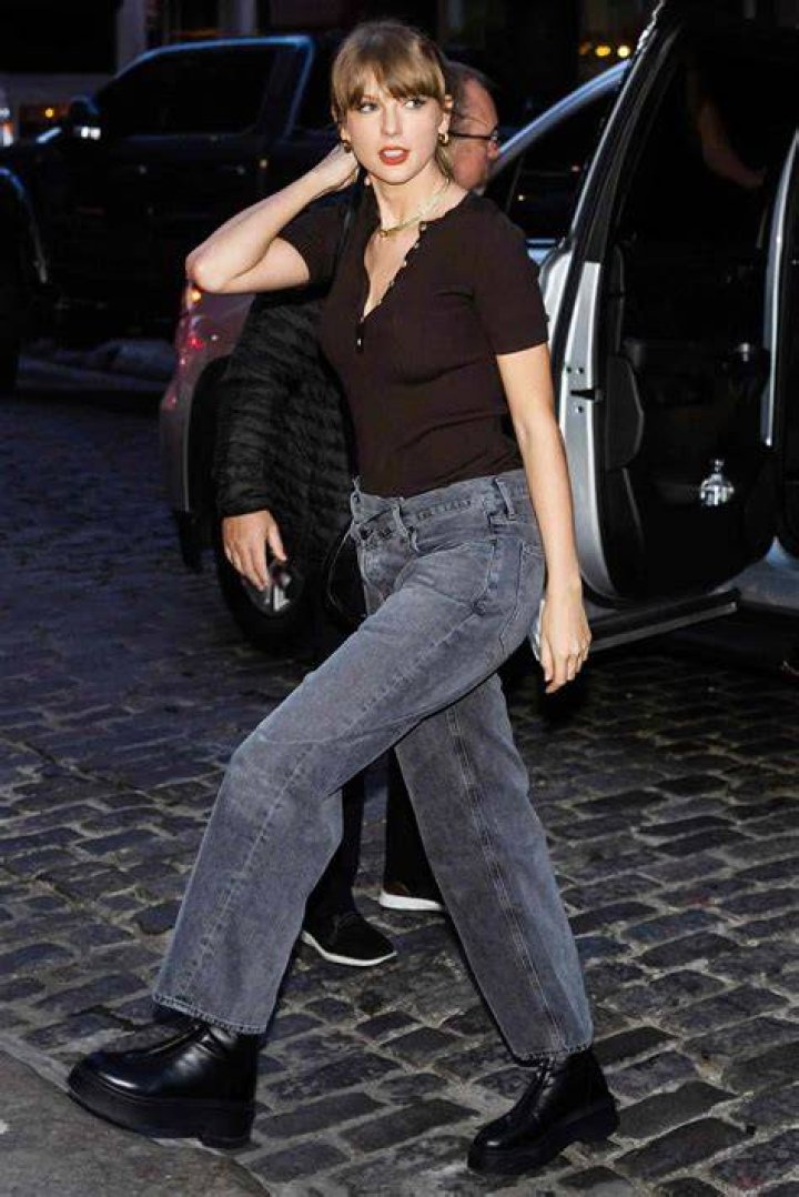 Stepping out: Taylor Swift appeared to discredit recent engagement rumours as she ventured out in London with long-term boyfriend Joe Alwyn on Thursday afternoon