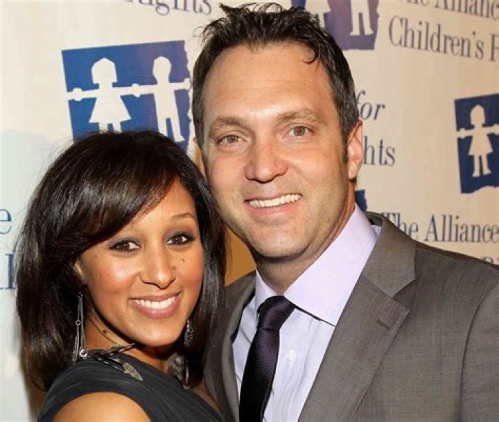 Tamera Mowry-Housley and Adam Housley arrive on the red carpet of the "Make-Up Artists and Hair Stylists Guild Awards" on February 20, 2016, in Hollywood, California | Source: Tibrina Hobson/Getty Images