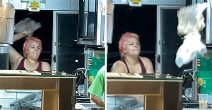The enraged customer destroying McDonald's property and throwing objects at the staff | Photo: 