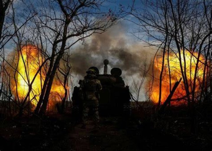 Ukrainian servicemen fire with a BM-21 Grad multiple rocket launch system, as Russia's attack on Ukraine continues, in Luhansk Region, Ukraine April 26